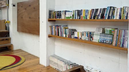 To the left of the library is a wall for rope work